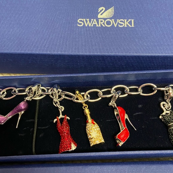 Stunning Swarovski charm bracelet. Dresses and shoes charms! Brand new - Picture 9 of 9